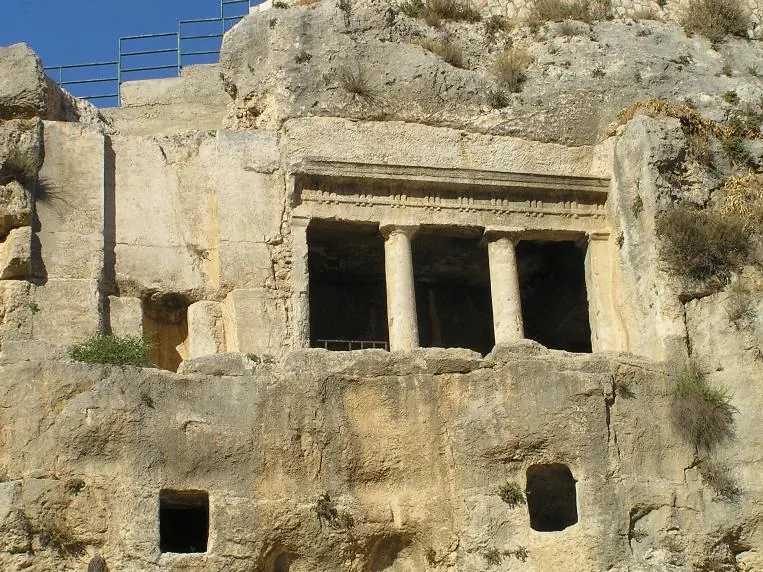 Rock-cut tomb facade with two Doric columns