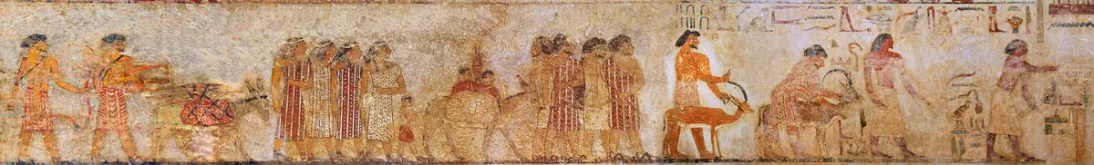 Painted Egyptian tomb scene of bearded men, women, and donkeys in colorful clothing