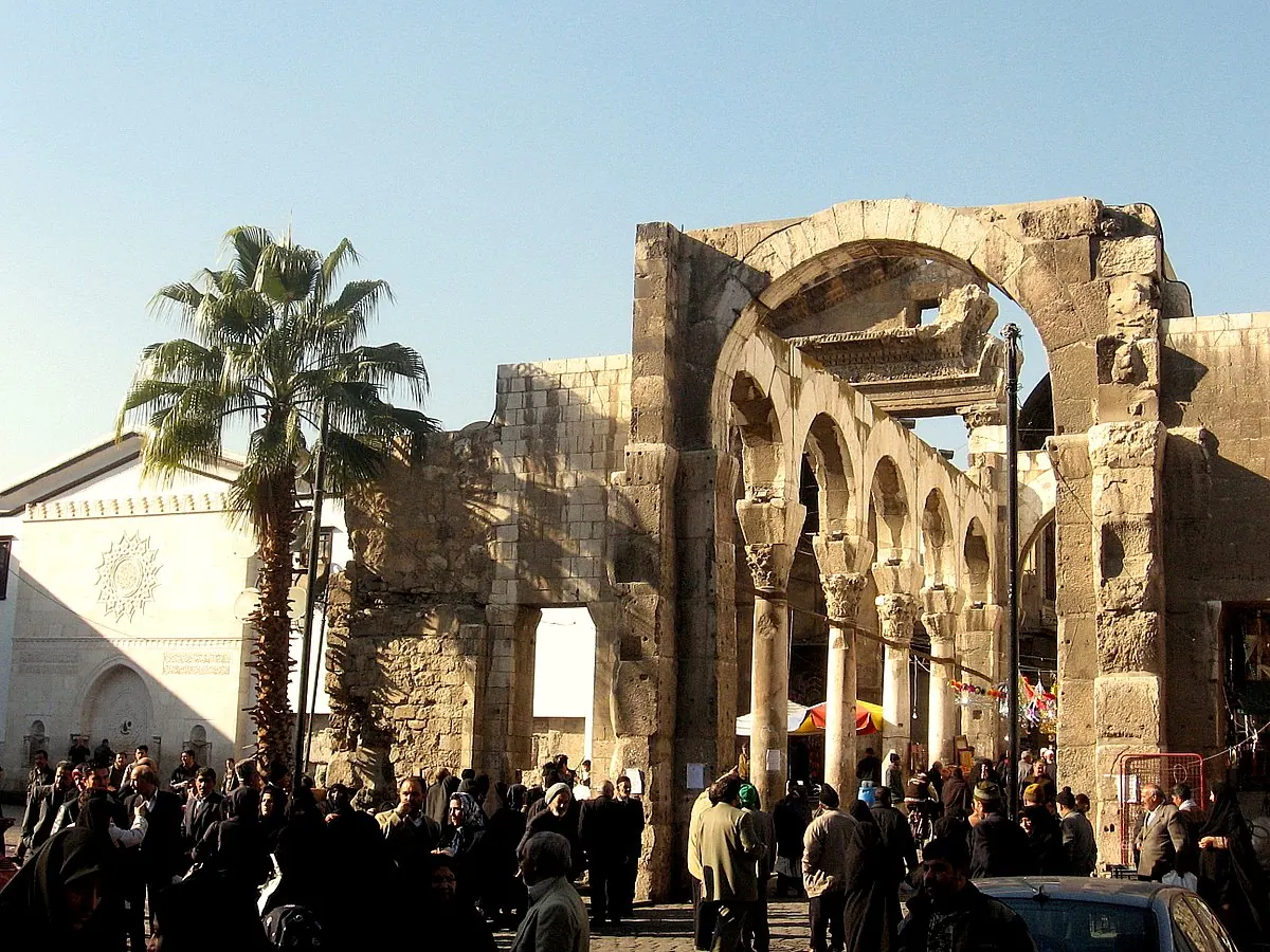 Roman arch spanning an old city street