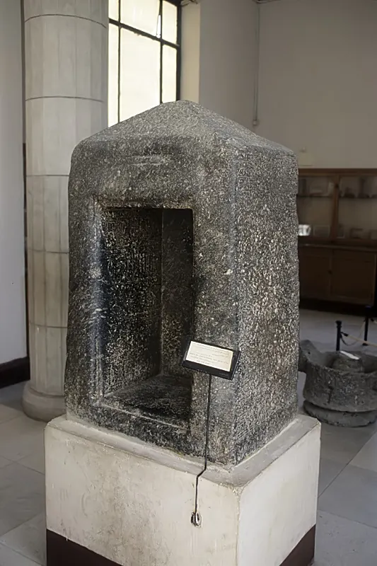 Black granite shrine in a museum