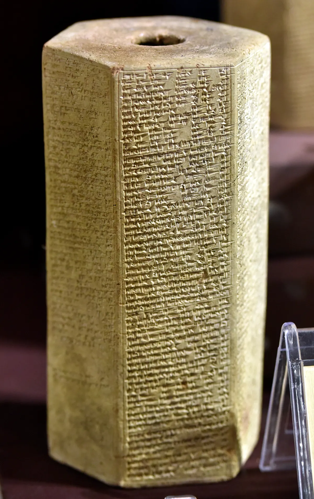Hexagonal clay prism inscribed with cuneiform