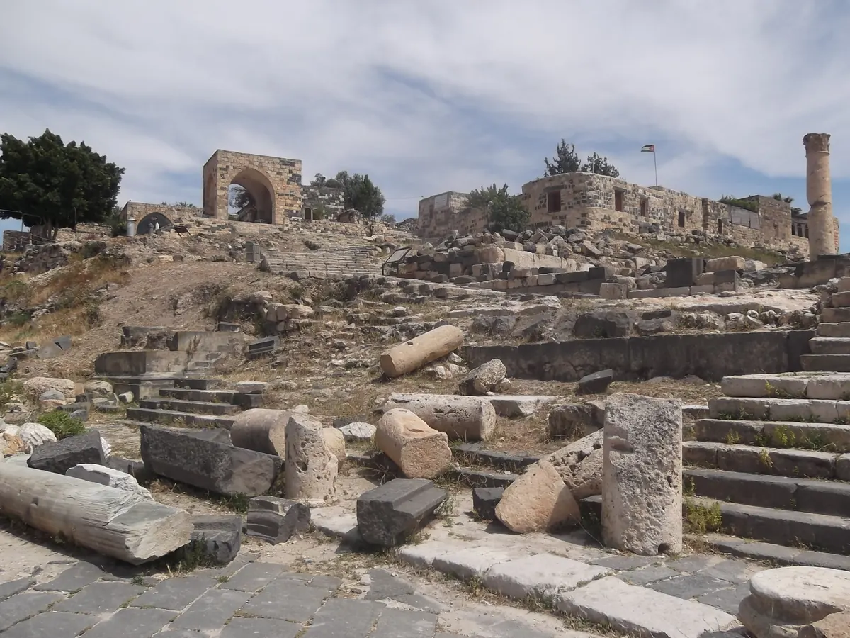 Black basalt Roman theatre overlooking a valley