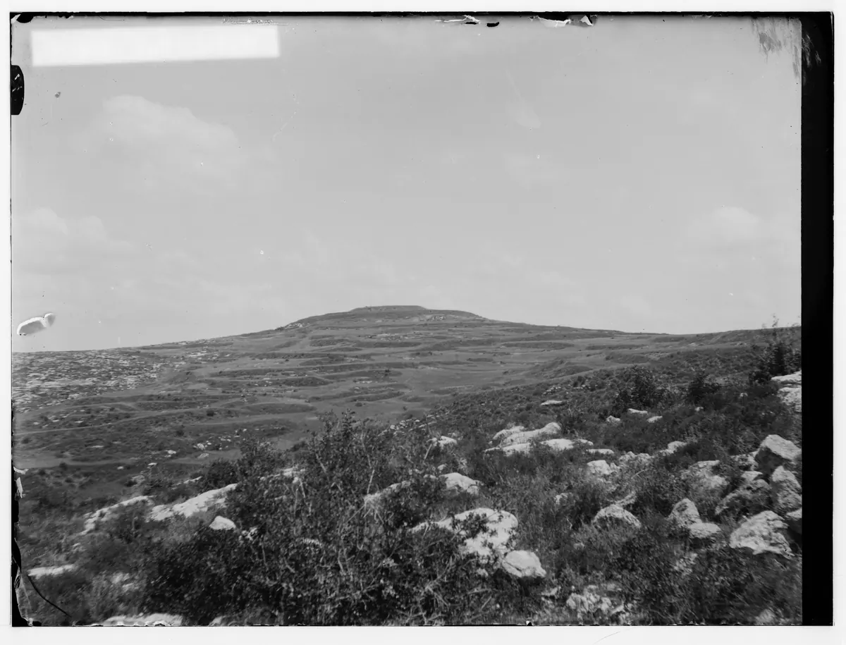 Hilltop with an unfinished concrete building