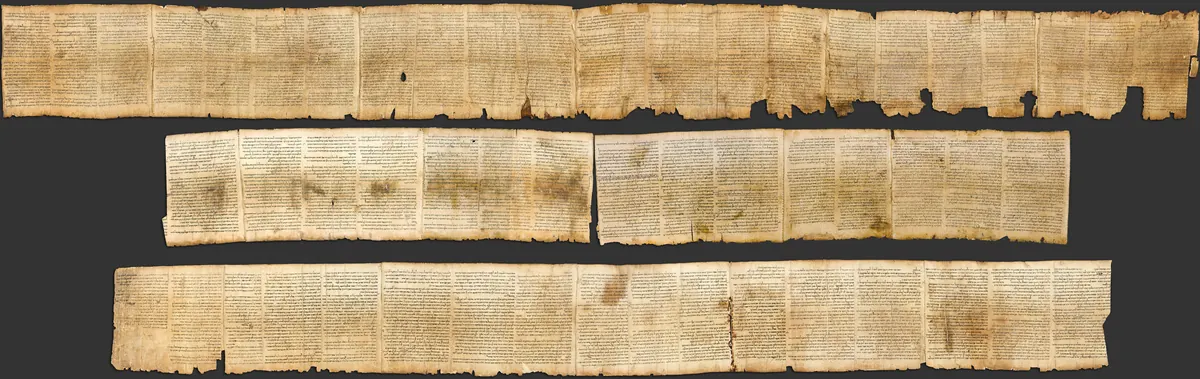 Unrolled parchment scroll with columns of Hebrew text