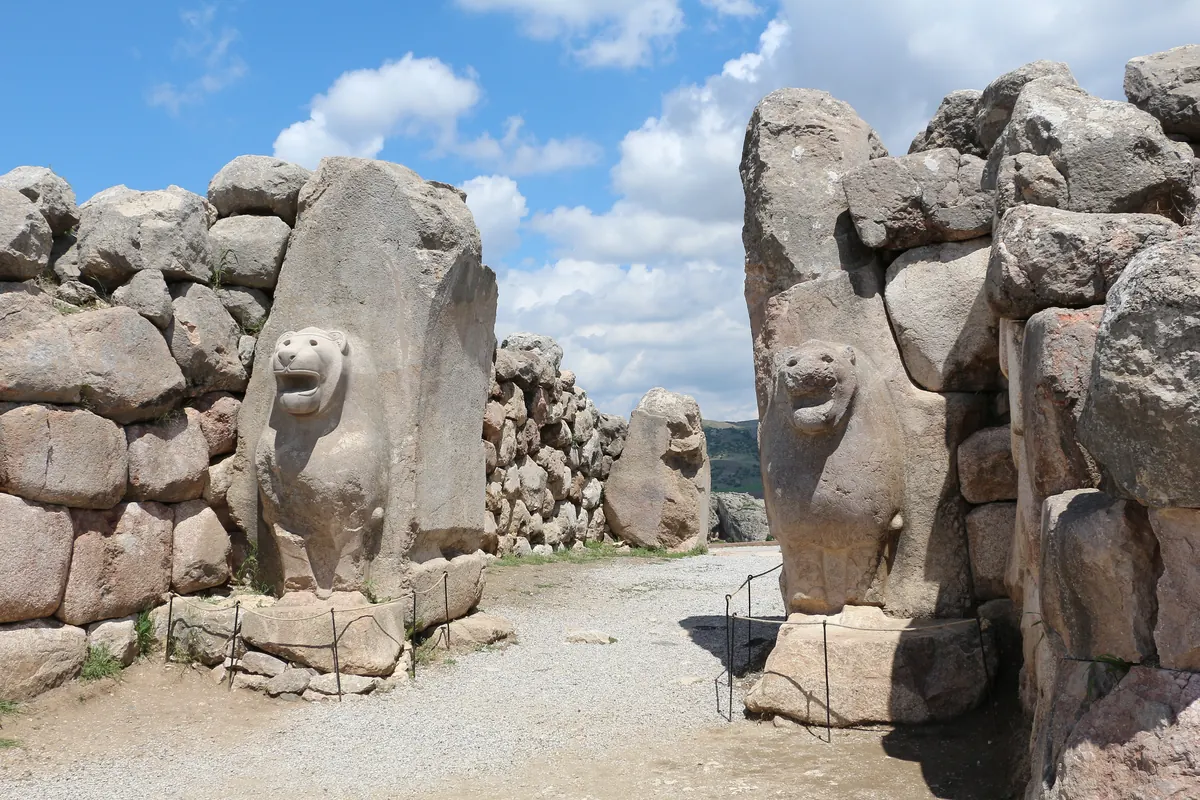 Stone gateway flanked by carved lions at Hattusa