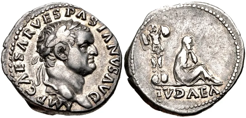 Bronze coin showing a seated mourning woman beneath a palm tree