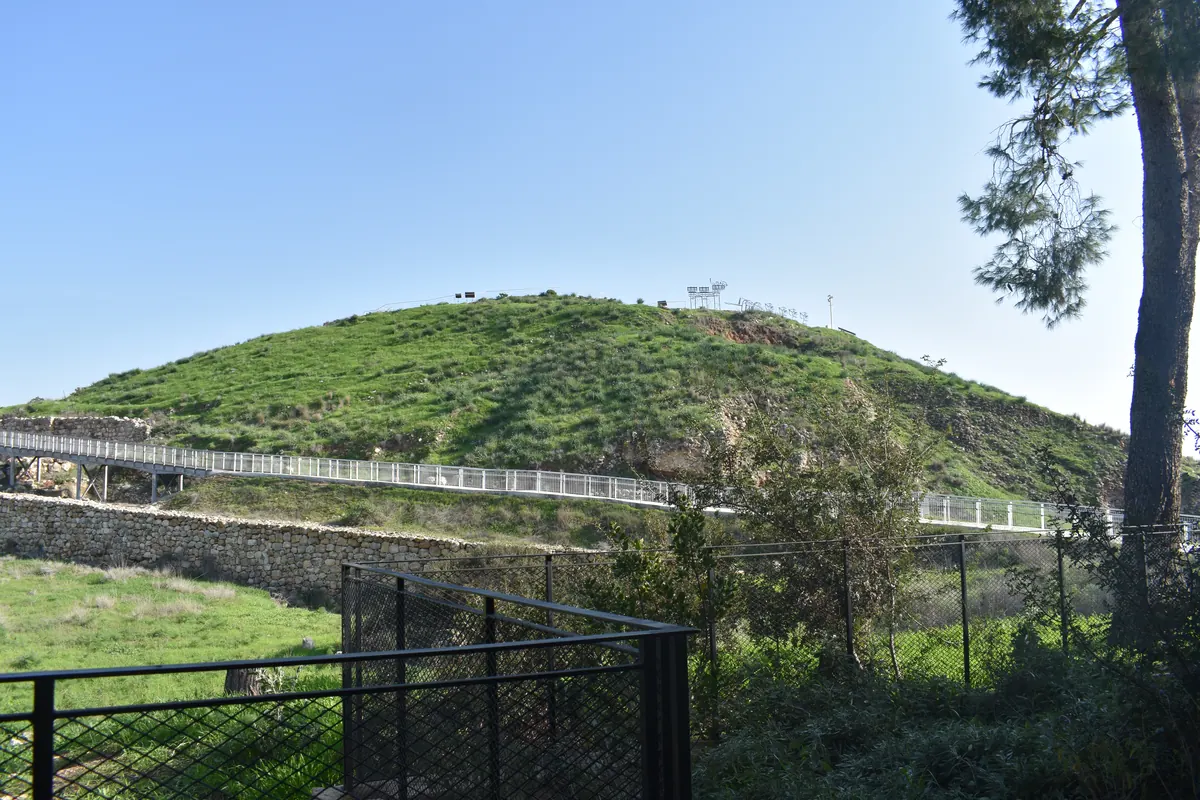 Stone-strewn slope against the corner of an ancient tell