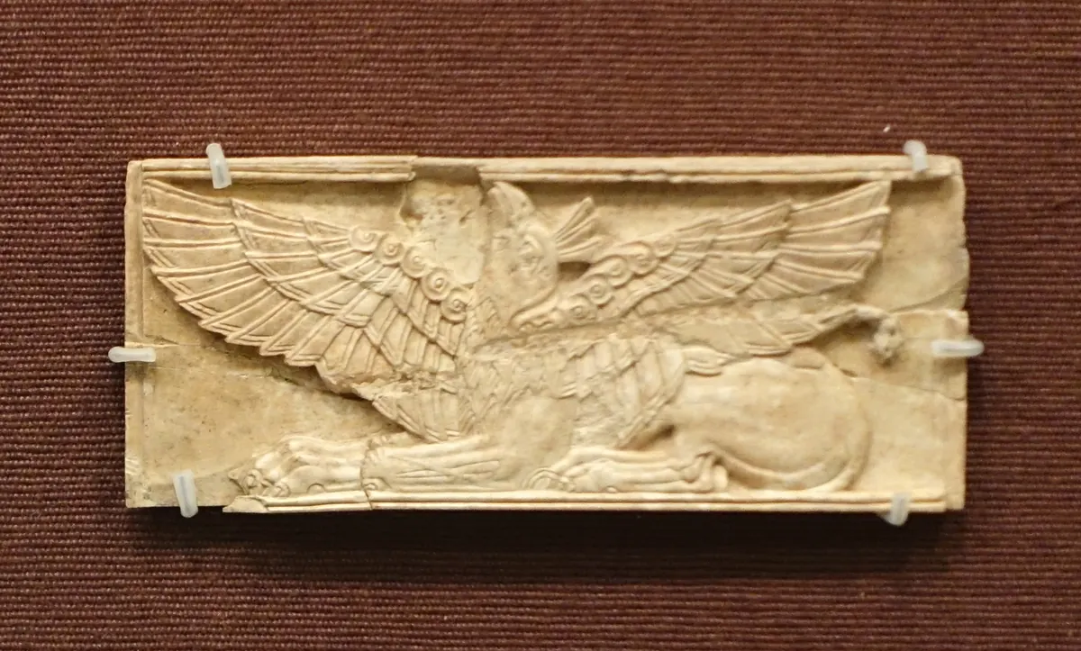 Carved ivory plaque of a winged griffin