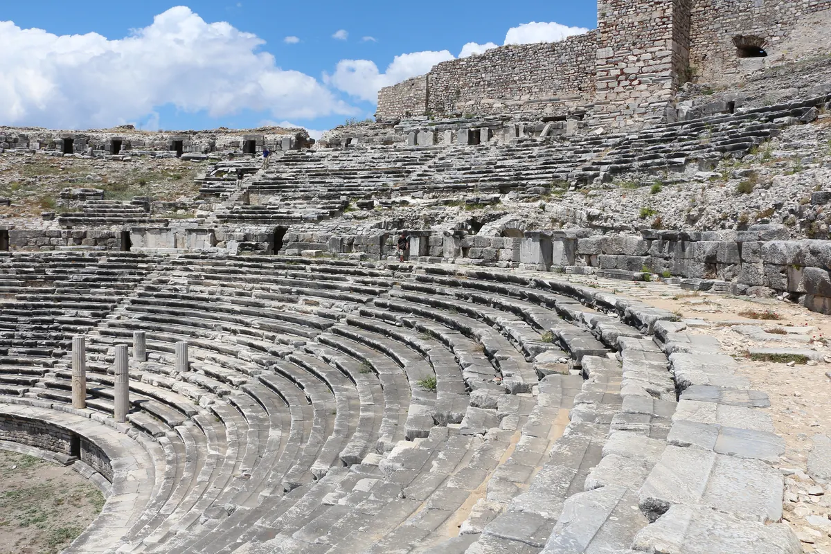 Large Roman theater cavea with inscribed marble seats