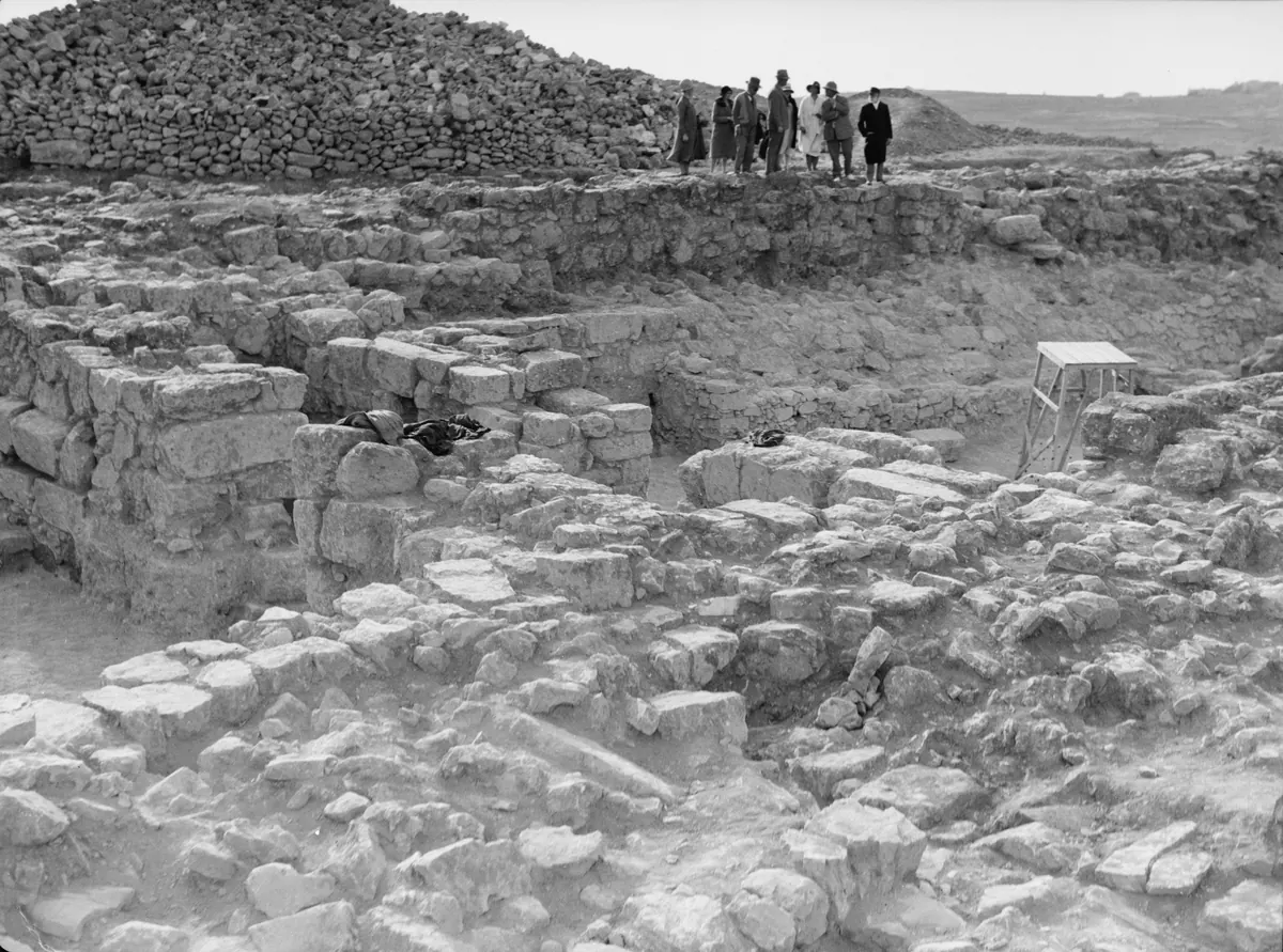 Old photograph of an excavated stone gateway