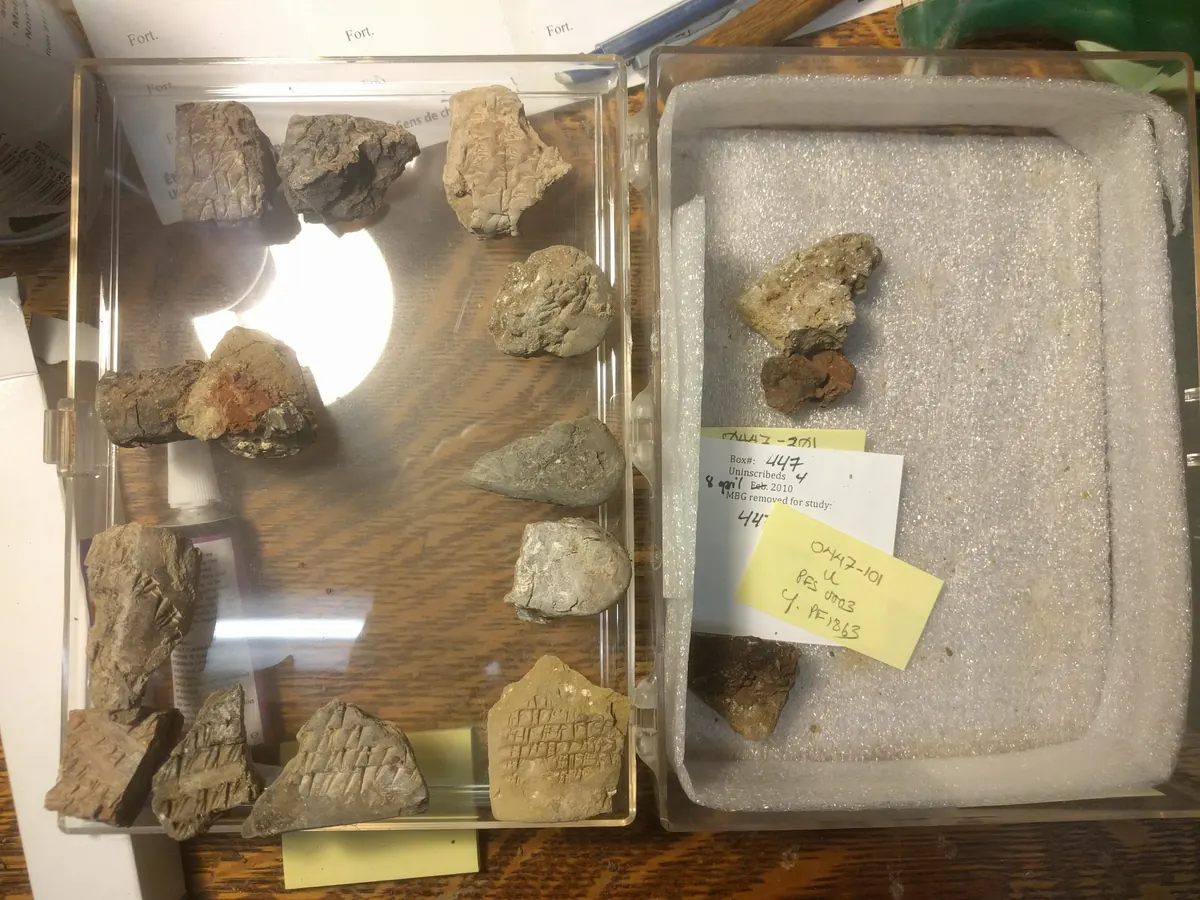 Small clay tablet with Elamite cuneiform and a rolled seal impression