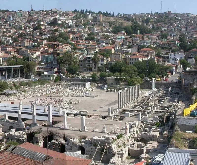 Ruined colonnade and vaulted galleries of a Roman market square