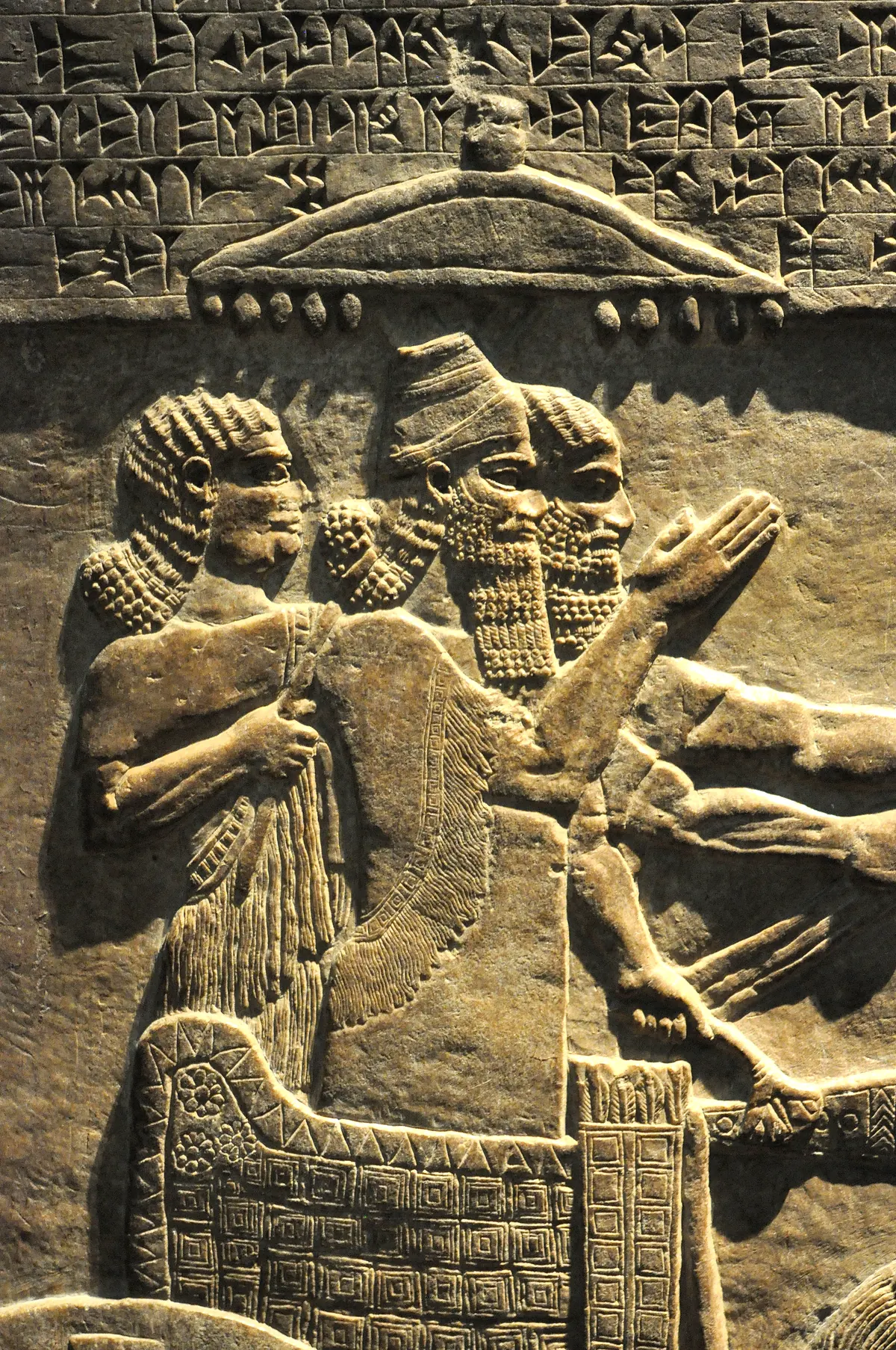 Alabaster relief of an Assyrian king in profile