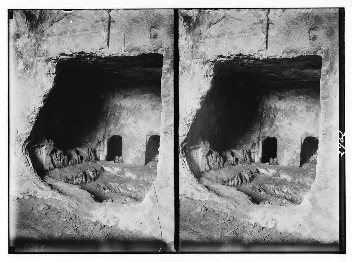 Rock-cut tomb openings on a valley slope